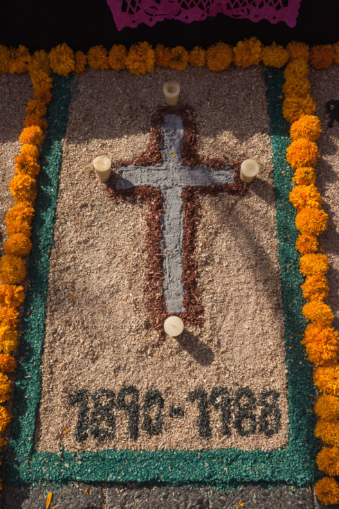 A grey cross made from ash at an altar on the Day of the Dead in Chapala, Jalisco, Mexico.