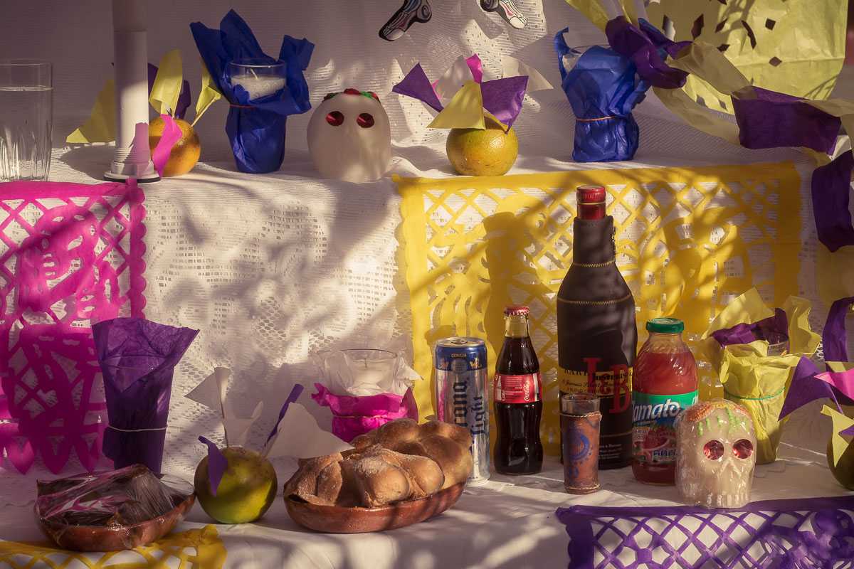 Corona, J&B Scotch Whisky and some mixers are some of the items left on this ofrenda in Ixtlahuacán de los Membrillos.