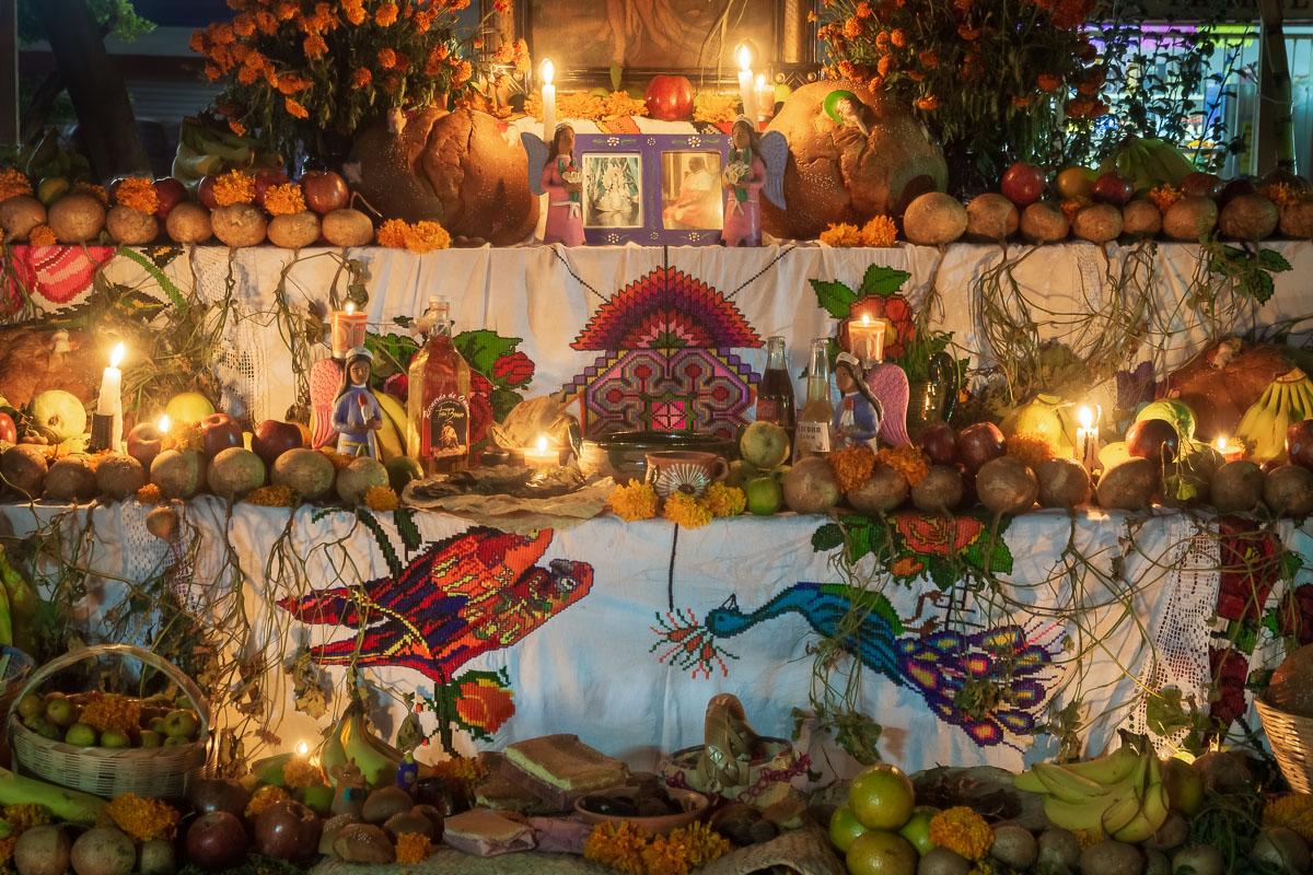 Fruits and vegetables overwhelm an altar in Ixtlahuacán de los Membrillos, Jalisco.