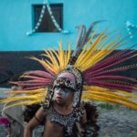 A young Aztec dancer takes part in the procession for the Virgin of the Rosary in Ajijic.