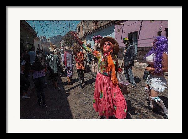 Framed photo of a sayaca throwing confetting during Carnival in Ajijic, Jalisco, Mexico