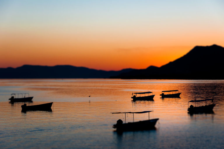 Boats on Lake Chapala at Sunset