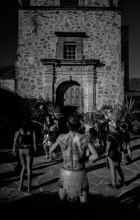 Aztec Dance Ritual in Front of a Church in Mexico