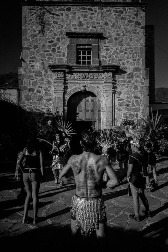 Aztec dancers welcome the return of the image of Saint Sebastian to the old Ajijic church. The saint is the local patron saint of the barrio of San Sebastián, which celebrates its patrón every January 20.