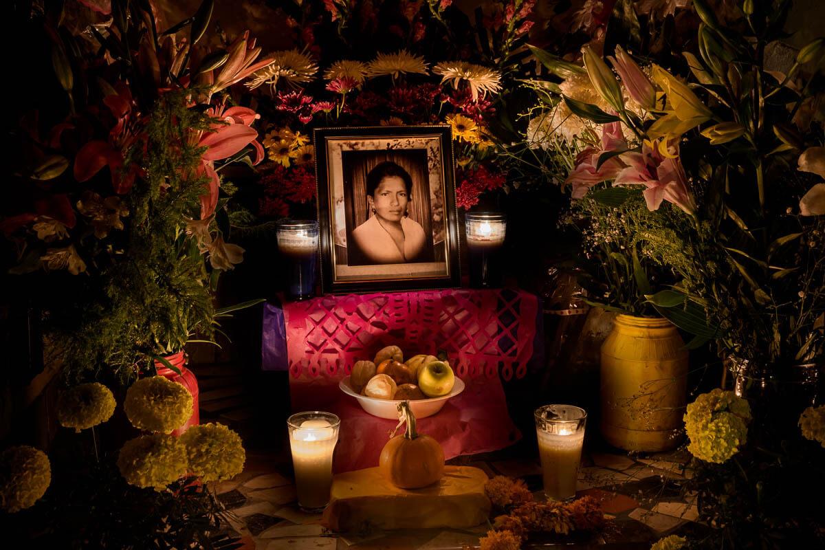 A woman's portrait is illuminated by candlelight on November 1, 2015, in Ajijic, Jalisco, Mexico.
