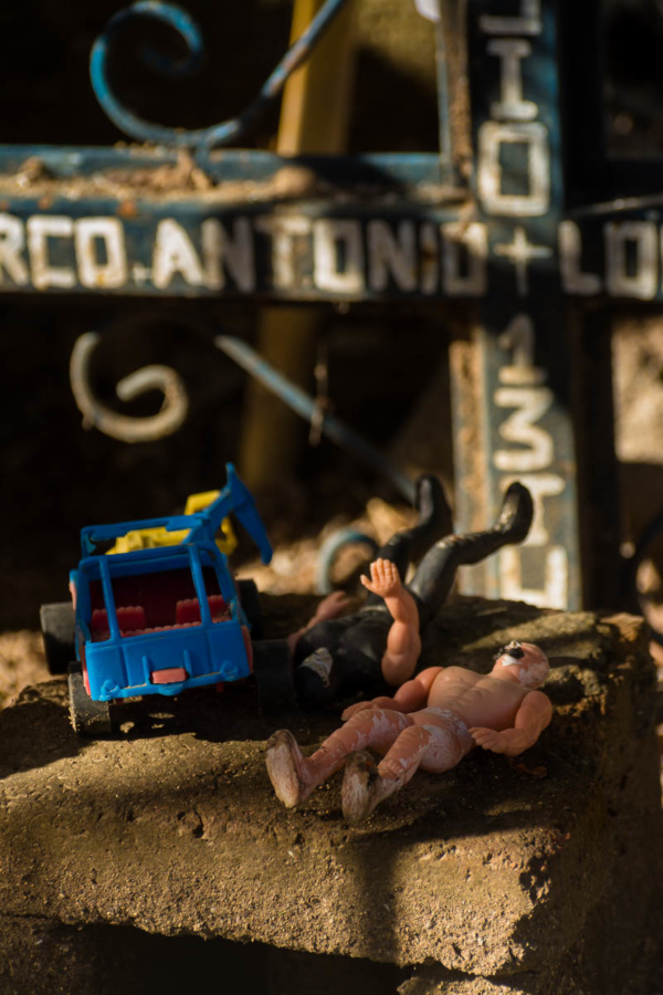 Toys left on a grave on the Day of the Dead in Ajijic, Jalisco. November 1 is called Día de los Angelitos and families build altars in the afternoon for deceased children in the family.