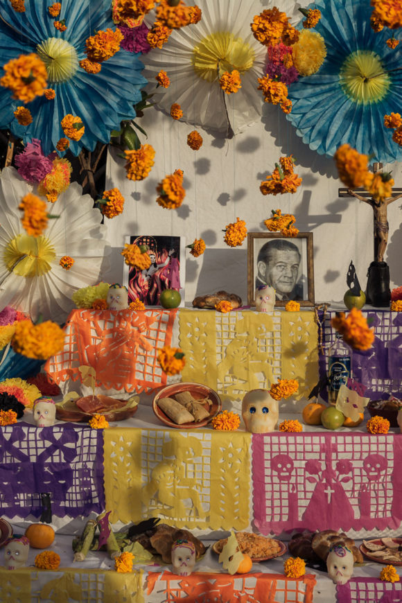 Marigold flowers hang at an altar on the Day of the Dead in Chapala, Mexico.