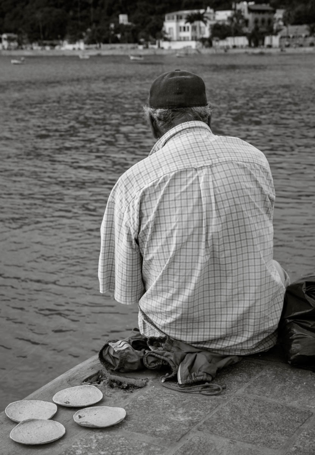 Man using tortillas as fishing bait at Lake Chapala.