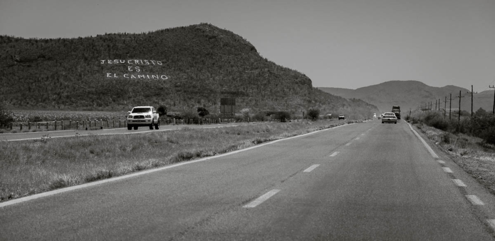 "Jesus Christ is the Way" is written on a hillside beside Highway 15 in Sinaloa, Mexico.
