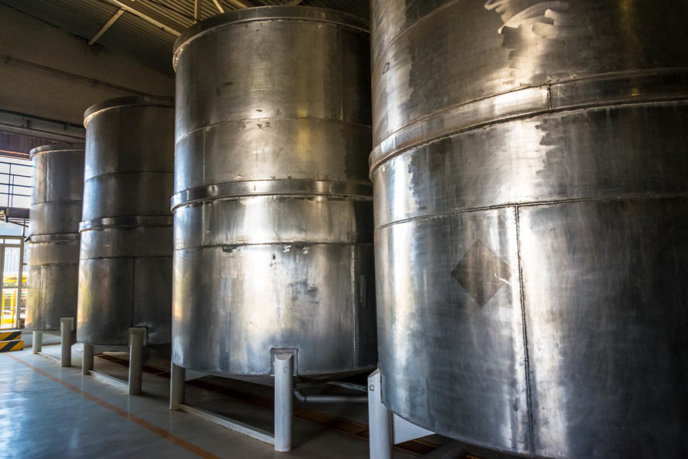 Tequila Fermenting in 8,000-gallon tanks at Tequila Cazadores in Arandas, Jalisco