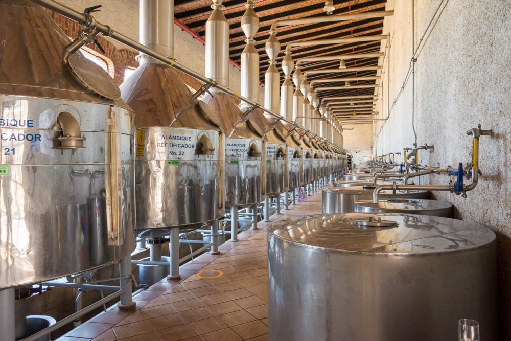 Distillation tanks distilling tequila at the Tequila Cazadores distillery in Arandas, Jalisco, Mexico.