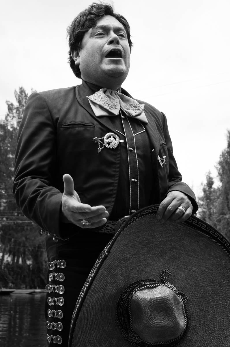 Mariachi singer singing at Xochimilco.