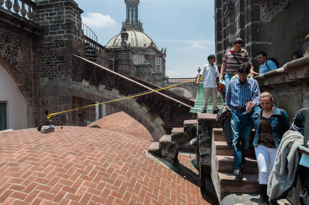 People on the vaults of Mexico City's Metropolitan Cathedral.