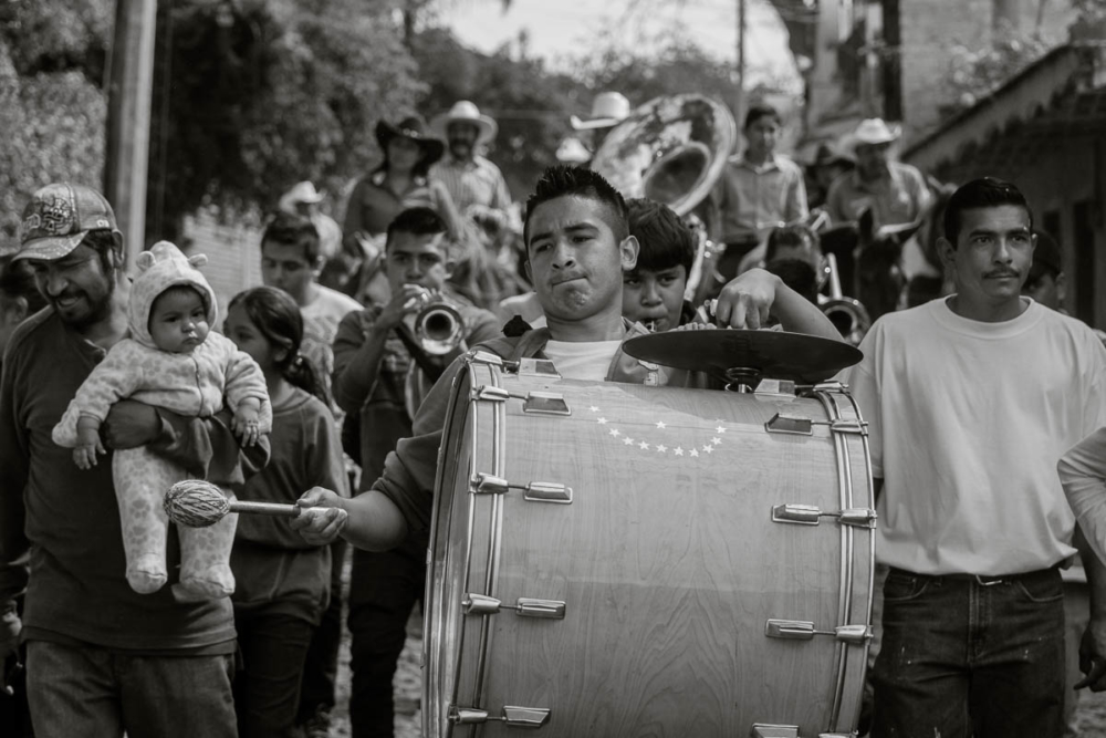 A banda in Mexico playing music during a Carnaval parade.