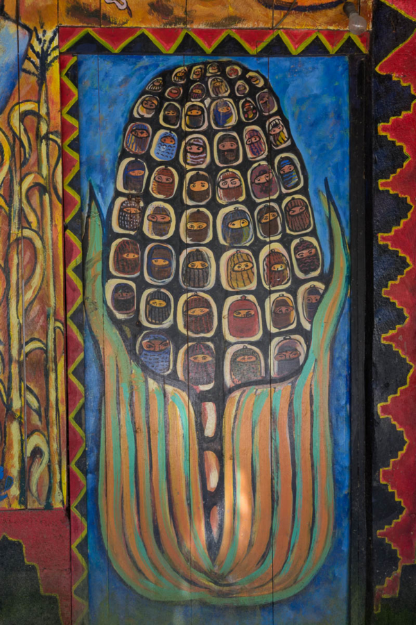 Zapatista masks in kernels of corn.