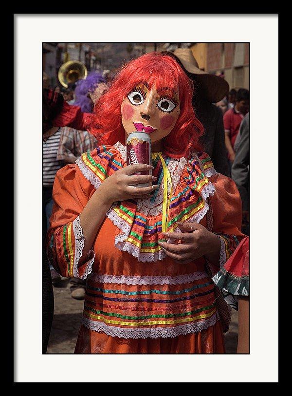 Framed fine art photo of a sayaca drinking a Victoria beer during Carnival in Ajijic, Mexico