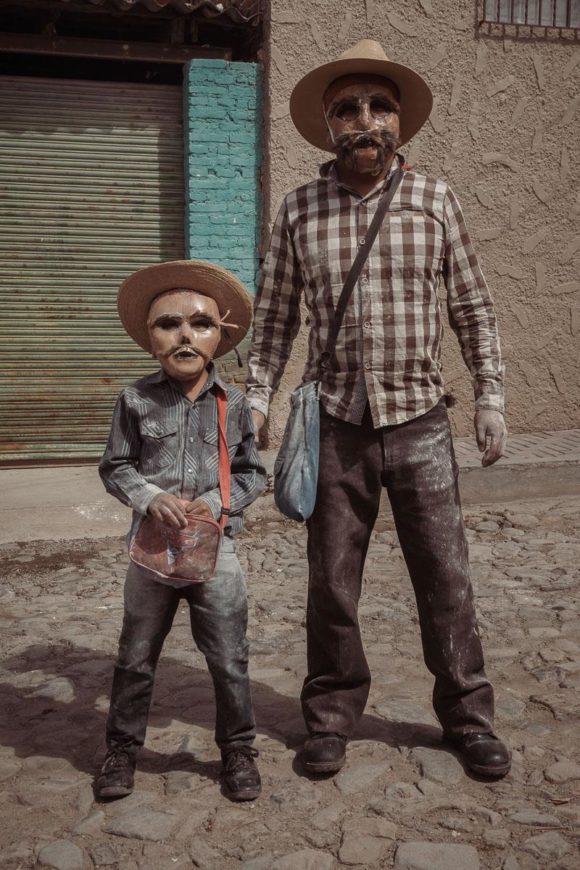 Fine art print of father and son sayacos during Carnival in Ajijic, Jalisco, Mexico