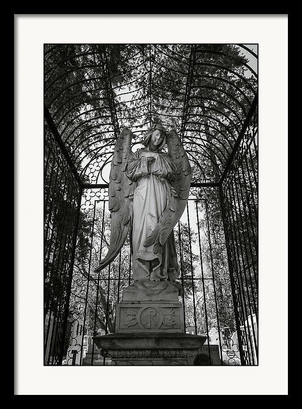 Framed fine art photography print of a graveyard angel in cage, Mexico