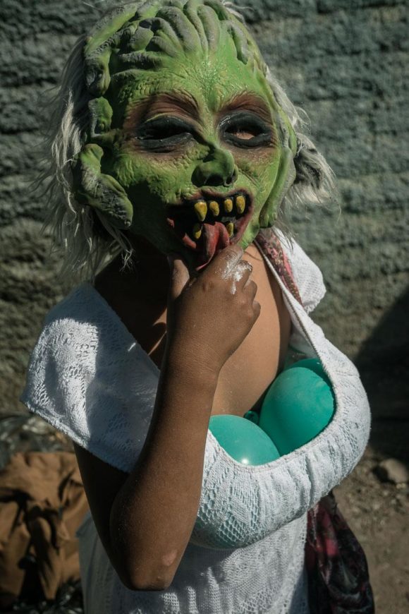 Photo print of a Sayaca with green mask in Ajijic, Jalisco, Mexico