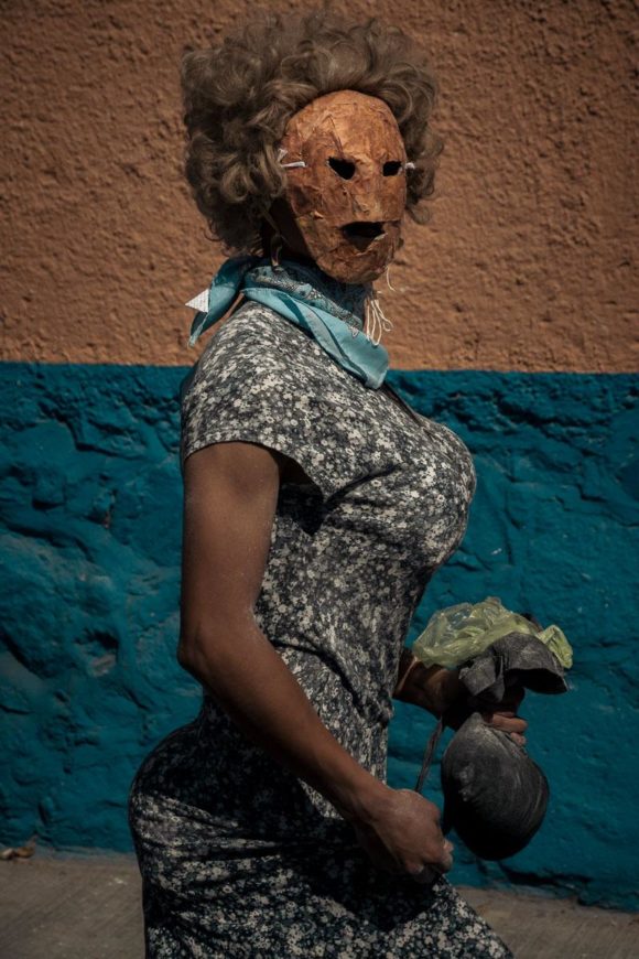 Sayaca in a blue dress in Ajijic, Mexico during Carnival