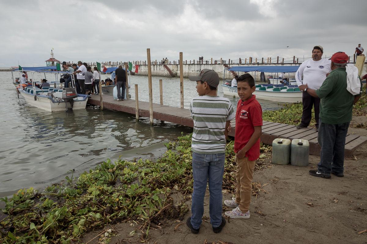 Boat operators donate a flotilla of around 40 boats for people to accompany the Virgin of Zapopan on her journey to nearby Island of the Scorpions, located in Lake Chapala, Mexico.